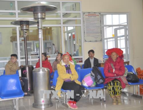 Người dân Sa Pa gồng mình chống chọi với giá rét ảnh 2